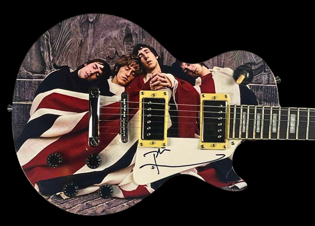 The Who: Pete Townshend In-Person Signed "The Kids Are Alright" Themed Les Paul-Style Guitar (JSA): Custom Les Paul-style electric guitar featuring artwork from The Who’s classic photo session used on "The Kids Are Alright" cover, signed on the pickguard in black felt tip marker by Pete Townsh