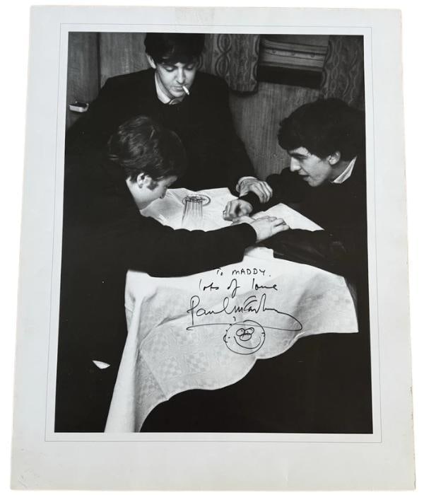 The Beatles: Paul McCartney Signed Oversized 23.5" x 19" Photo w/ Doodle (JSA Authentication): Sizable black-and-white 23.5" x 19" photo signed in black felt tip marker by the Beatles band member Paul McCartney, who also inscribed "To Maddy lots of love" before his signature, as well as a facia