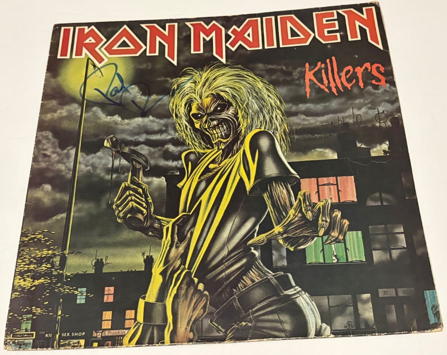 Iron Maiden: Paul Di'Anno Signed "Killers" Album (JSA Authentication): "Killers" album signed on the cover in blue felt tip marker by Iron Maiden band member Paul Di'Anno. Measuring approximately 12" x 12" and in fine condition. Record is not included. Authenticated by