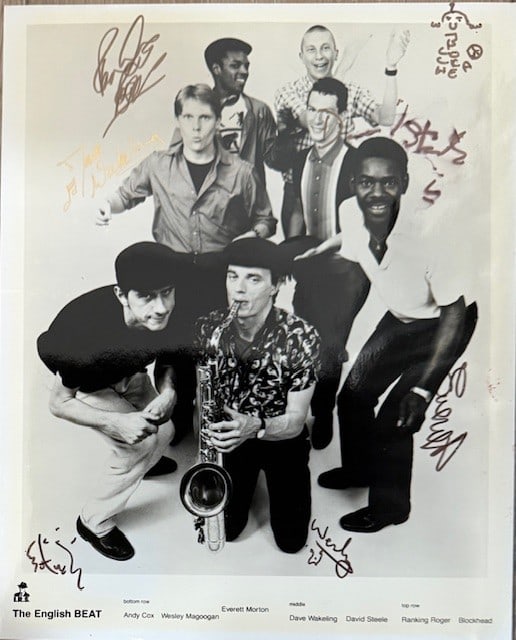 English Beat Fully Signed 10" x 8" Promo Photo (7 Sigs) (Third Party Guaranteed): Black-and-white 10" x 8" promotional photo signed in black felt tip marker by English Beat band members Wesley Magoogan, Dave 'Blockhead' Wright, Dave Wakeling, David Steele, Saxa, Ranking Roger, Ever