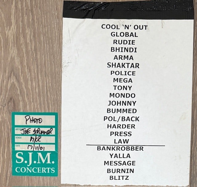 The Clash: Joe Strummer 2001 Setlist & Pass: White 11.5" x 8.5" paper setlist and pass for concert on November 17th, 2001. In fine condition.