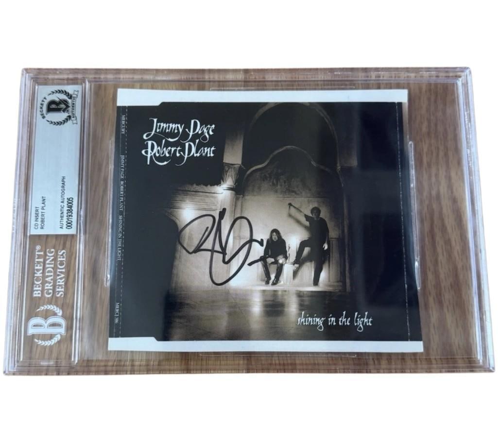 Led Zeppelin: Robert Plant Signed "Shining in the Light" CD (Beckett Encapsulated): "Shining in the Light" CD signed on the cover in black felt tip marker by Led Zeppelin band member Robert Plant. Measuring approximately 5" x 5" and in fine condition. Encapsulated and authenticated