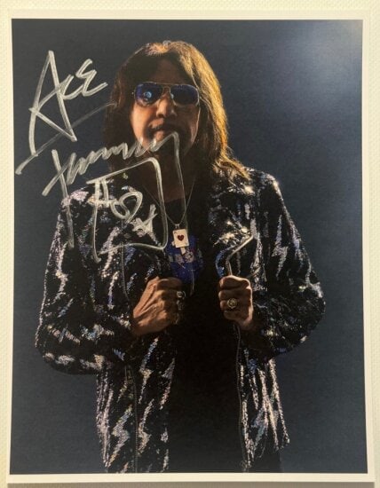 KISS: Ace Frehley Signed 10" x 8" Photo (PSA/DNA Authentication): Color 10" x 8" photo signed in silver felt tip marker by KISS band member Ace Frehley. In fine condition. Authenticated by PSA/DNA, with their official hologram affixed to the back bottom right