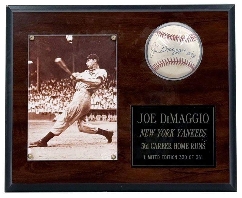 Joe DiMaggio Signed Rawlings Brand OMLB Baseball Custom Wooden Display (Beckett): Brown wooden 13" x 11" display mounting white Rawlings brand Bobby Brown OMLB baseball signed on the sweet spot in blue ballpoint pen by baseball player Joe DiMaggio, who also inscribed "330/361"