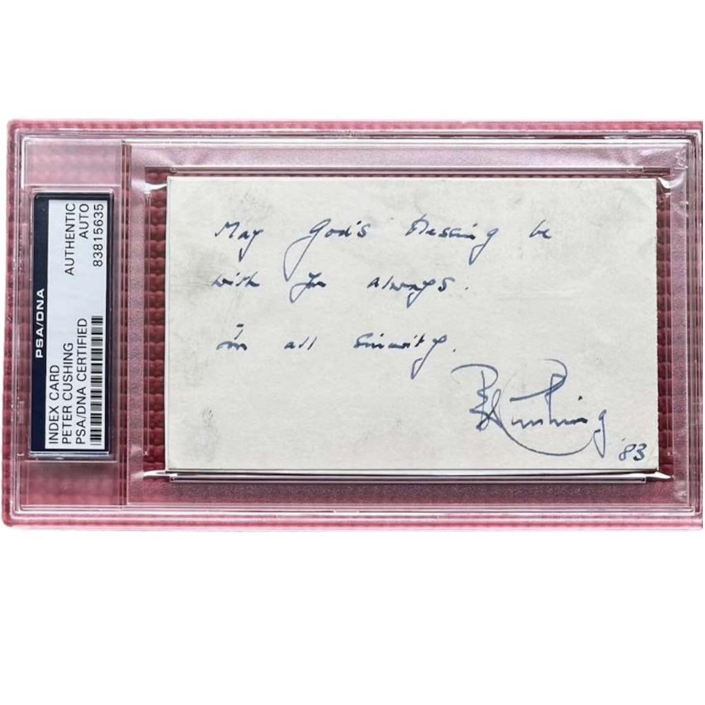 Peter Cushing Signed Undedicated Index Card (PSA/DNA Encapsulated): White index card signed in blue ballpoint pen by actor Peter Cushing, who inscribed "May god's blessing be with you always in all sincerity." In fine condition. Encapsulated and authenticated by