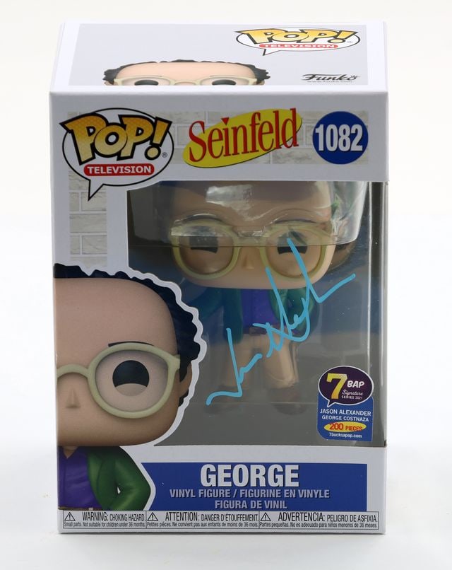 Seinfeld: Jason Alexander Signed "George" Funko Pop #1082 (JSA Authentication): Official Seinfeld "George" Funko Pop #1082 signed on the front plastic window in blue paint pen by actor Jason Alexander. Measuring approximately 6.25" x 4.5" x 3.5" and in fine condition.
