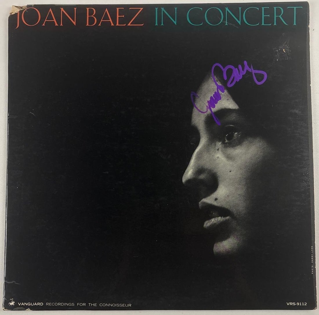 Joan Baez Signed "Joan Baez in Concert" Album (Beckett Authentication): "Joan Baez in Concert" album signed on the cover in purple paint pen by musician Joan Baez. Measuring approximately 12" x 12" and in very good condition, with some signs of scattered wear, including