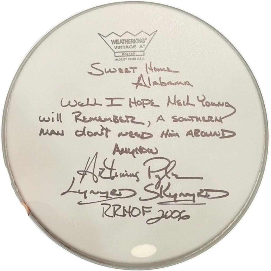 Lynyrd Skynyrd: Artimus Pyle Signed 10" Weatherking Vintage Brand Drumhead (JSA Authentication): White 10" Weatherking Vintage brand drumhead signed on the front in black felt tip marker by Lynyrd Skynyrd band member Artimus Pyle, who also inscribed lyrics to the song "Sweet Home Alabama" and