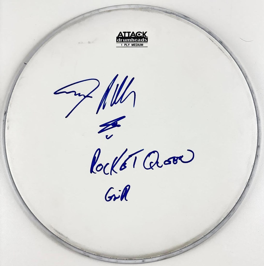 Guns N' Roses: Steven Adler Signed 12" Attack Brand Drumhead (Third Party Guaranteed): White 12" Attack Brand drumhead, signed on the front in blue felt tip marker by Guns N' Roses band member Steven Adler, who inscribed "Rocket Queen girl" after his signature. In fine condition. Authen