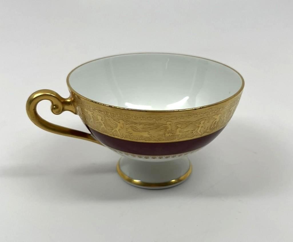Meyer Lansky Personally-Owned Monogrammed "L" Tea Cup (Originating from Lansky's Grandson): Personally owned and used white porcelain tea cup belonging to legendary organized crime figure Meyer Lansky, featuring a thick gold gilt rim, burgundy base, gold-trimmed foot, and curved handle. The 