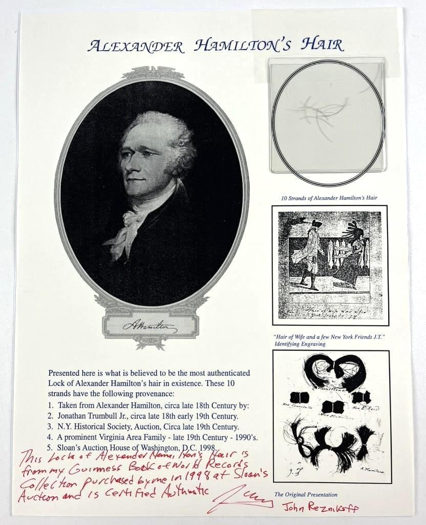 Alexander Hamilton 18th Century Hair Strands Multi-Authenticated Sample (Reznikoff Authentication): One page 11.5" x 8" paper presenting a small plastic overlay enclosed with ten strands of politician Alexander Hamilton's hair, each measuring approximately 0.5" x 1.25" in length. Hair sample has