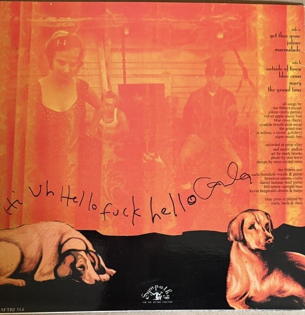 The Geraldine Fibbers: Carla Bozulich Signed "Get Thee Gone" Album (Third Party Guaranteed): "Get Thee Gone" album signed on the back cover in black felt tip marker by The Geraldine Fibbers band member Carla Bozulich. Measuring approximately 10" x 10" and in fine condition. Record is