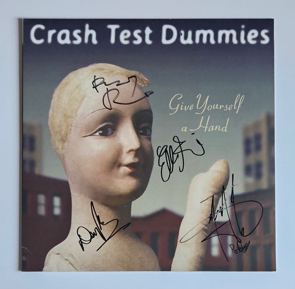 Crash Test Dummies Original Lineup Fully Signed "Give Yourself a Hand" Album (5 Sigs) (Third Party): "Give Yourself a Hand" album signed on the cover in black felt tip marker by Crash Test Dummies original lineup band members Brad Roberts, Ellen Reid, Dan Roberts, Mitch Dorge, and Benjamin Darvill.