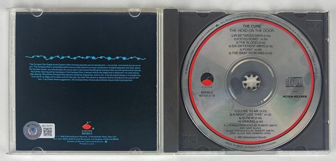 The Cure: Robert Smith Signed "The Head on the Door" CD (Beckett Authentication) - 2