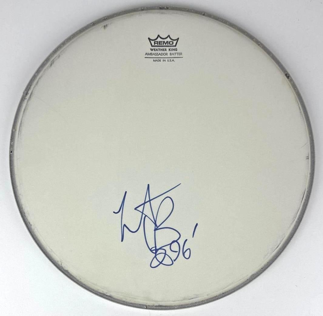 The Rolling Stones: Charlie Watts Signed 13" Remo Brand Drumhead (Third Party Guaranteed): White 13" x 13" Remo brand drumhead signed in black felt tip marker by the Rolling Stones band member Charlie Watts, who inscribed the date "96'" after his signature. In fine condition. Provenance Eat