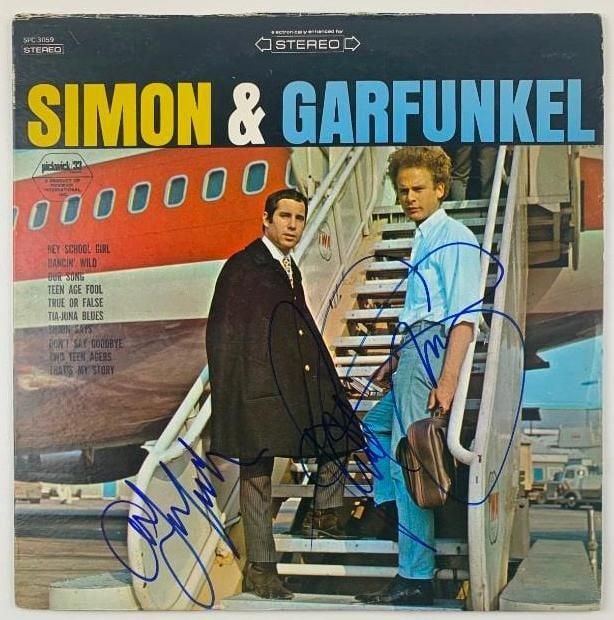 Simon & Garfunkel Fully Group Signed “The Hit Sounds of Simon & Garfunkel Album (Beckett): "The Hit Sounds of Simon & Garfunkel" album signed on the cover in blue felt tip marker by musicians Paul Simon and Art Garfunkel. Measuring approximately 12" x 12" and in fine condition. Record is