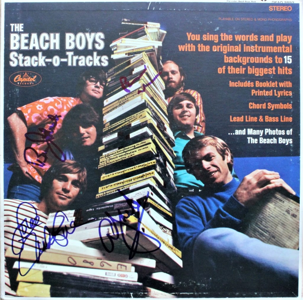 The Beach Boys Group Signed “Stack-O-Tracks” LP Album (4 Sigs) (ACOA Authentication): “Stack-O-Tracks” LP album signed on the cover in blue felt tip marker by The Beach Boys band members Brian Wilson, Al Jardine, Bruce Johnston, and Mike Love. Measuring approximately