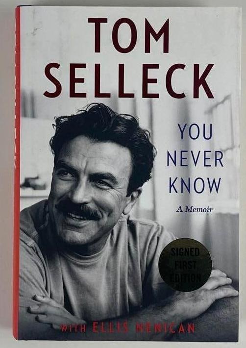 Tom Selleck Signed "You Never Know" Book (Beckett Authentication): Color hardcover 9.5" x 6.25" "You Never Know" book signed on the inside front page in black ballpoint pen by actor Tom Selleck. In fine condition. Authenticated by Beckett, with their official hologra