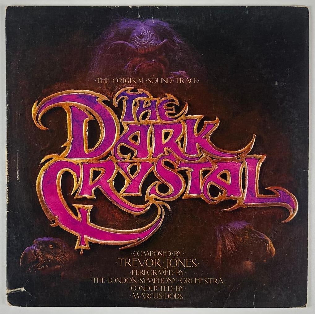 Brian Froud Signed "The Dark Crystal" Original Soundtrack Album (Beckett Authentication): "The Dark Crystal" original soundtrack album signed on the back cover in black felt tip marker by conceptual designer Brian Froud. Measuring approximately 12" x 12" and in fair to good condition with
