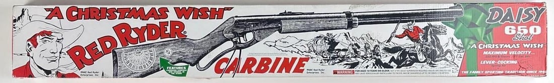 A Christmas Story: Peter Billingsley & Scott Schwartz Signed Red Ryder BB Gun (2 Sigs): Daisy brand "A Christmas Wish" 5" x 36.5" Red Ryder carbine BB gun popularized by the film "A Christmas Story," signed on the length of the barrel in silver felt tip marker by actors Peter