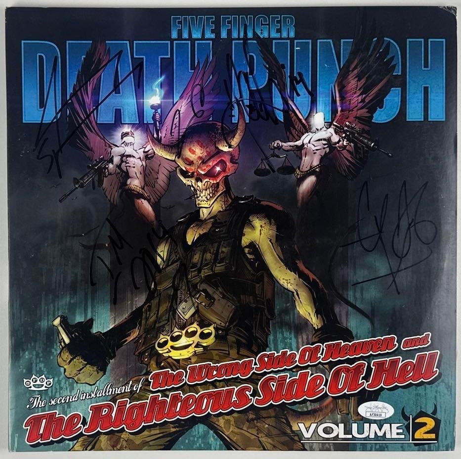 Five Finger Death Punch Group Signed "The Wrong Side of Heaven & the Righteous Side of Hell" Album: "The Wrong Side of Heaven & the Righteous Side of Hell" Vol. 2 album signed on the cover in black felt tip marker by Five Finger Death Punch band members Ivan Moody, Jeremy Spencer, who inscribed the 