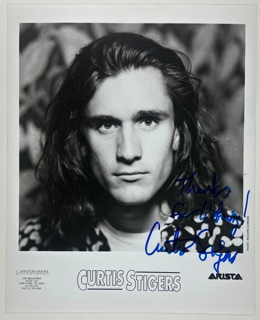 Curtis Stigers Signed 10" x 8" Promo Photo (JSA Authentication): Black-and-white 10" x 8" promotional photo signed in blue felt tip marker by musician Curtis Stigers who inscribed "Thanks for listening!" before his signature. In fine condition. Authenticated by