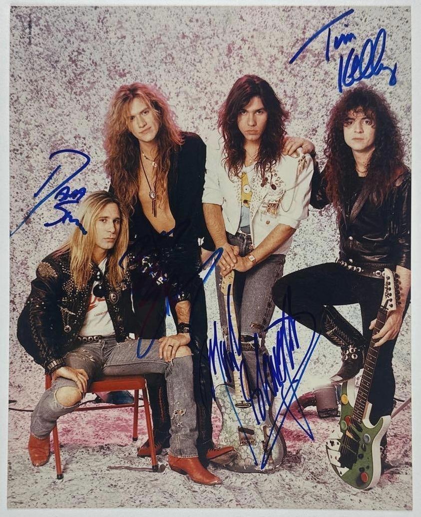 Slaughter Group Signed 10" x 8" Photo (4 Sigs) (JSA Authentication): Color 10" x 8" photo signed in blue felt tip marker by Slaughter band members Tim Kelly, Dana Strum, Mark Slaughter, and Blas Elias. In fine condition. Authenticated by JSA. Provenance This piece was 
