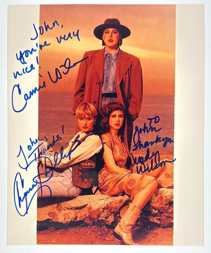 Wilson Phillips Group Signed 8" x 10" Photo (3 Sigs) (Third Party Guaranteed): Color 8" x 10" photo signed in blue felt tip marker by Wilson Phillips band members Wendy Wilson, who inscribed "To John thank you" before her signature, Carnie Wilson, who inscribed "John, you're ver