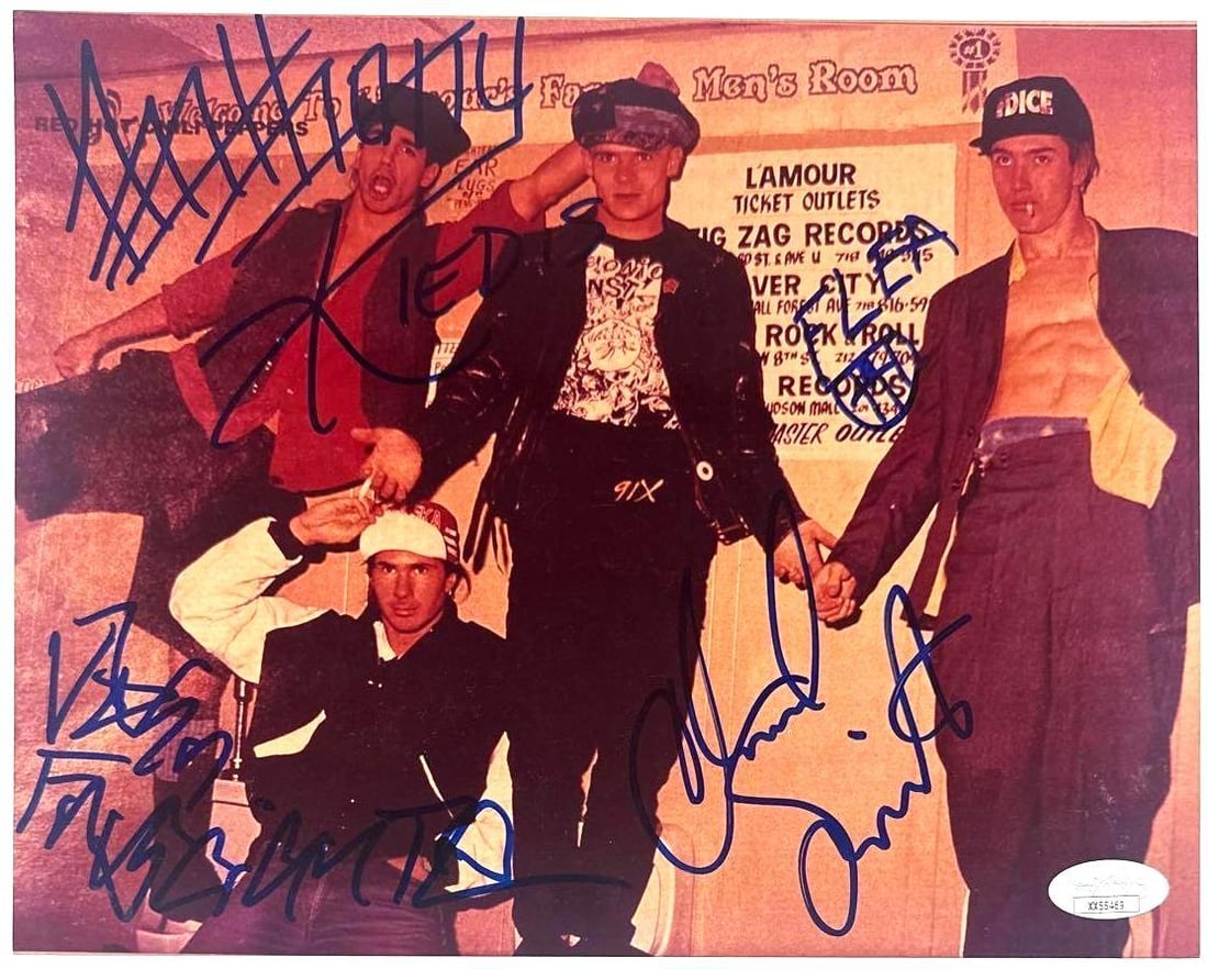 Red Hot Chili Peppers Fully Group Signed 8" x 10" Photo (4 Sigs) (JSA Authentication): Great color 8" x 10" photo signed in blue felt tip marker by Red Hot Chili Peppers band members Flea, Anthony Kiedis, Chad Smith, and John Frusciante. In fine condition. Accompanied by a full Letter