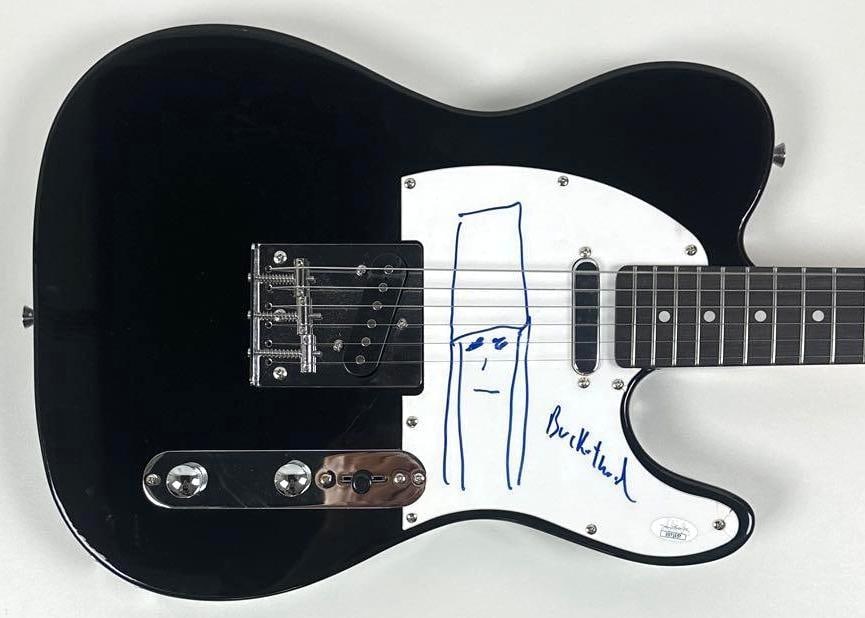 Buckethead Signed Telecaster-Style Guitar (JSA Authentication): Black Telecaster-style guitar signed on the pickguard in blue felt tip marker by musician Buckethead, who also drew a sketch of himself to the left of his signature. Measuring approximately 38.5" x