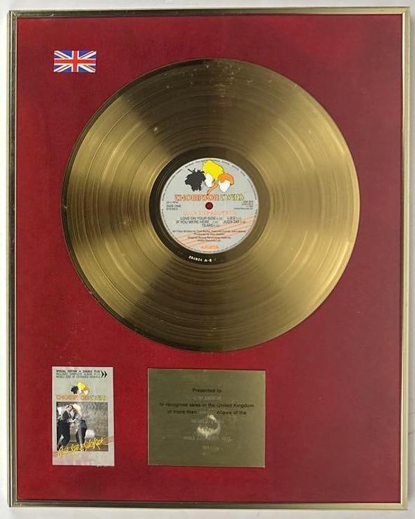 Thompson Twins "Quick Step & Side Kick" UK Sales Award Presented to Chip Rachlin: United Kingdom Sales Award presented to Chip Rachlin to recognize sales in the United Kingdom of more than 100,000 copies of the Arista Records album "Quick Step & Side Kick" by Thompson Twins. The