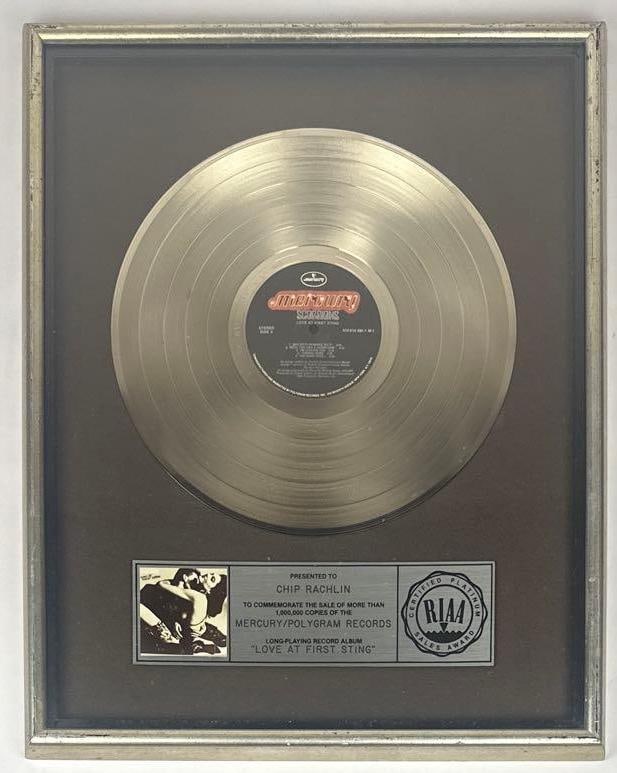 Scorpions "Love at First Sting" RIAA Platinum Sales Award Presented to Chip Rachlin: RIAA Certified Platinum Sales Award presented to Chip Rachlin to commemorate the sale of more than 1,000,000 copies of the Mercury/PolyGram Records album "Love at First Sting" by Scorpions. The