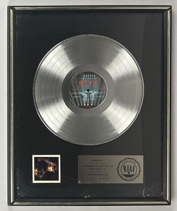 Styx "Kilroy Was Here" RIAA Platinum Sales Award Presented to Chip Rachlin: RIAA Certified Platinum Sales Award presented to Chip Rachlin to commemorate the sale of more than 1,000,000 copies of the A&M Records album "Kilroy Was Here" by Styx. The framed display, measuring