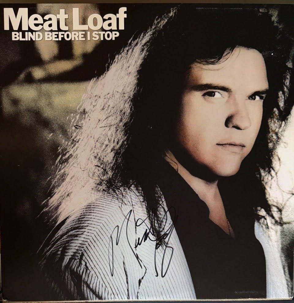 Meat Loaf Signed "Blind Before I Stop" Album (Third Party Guaranteed): "Blind Before I Stop" album signed on the cover in black felt tip marker by musician Meat Loaf. Measuring approximately 12" x 12", the jacket is in good condition with mild shelf wear and slight corne