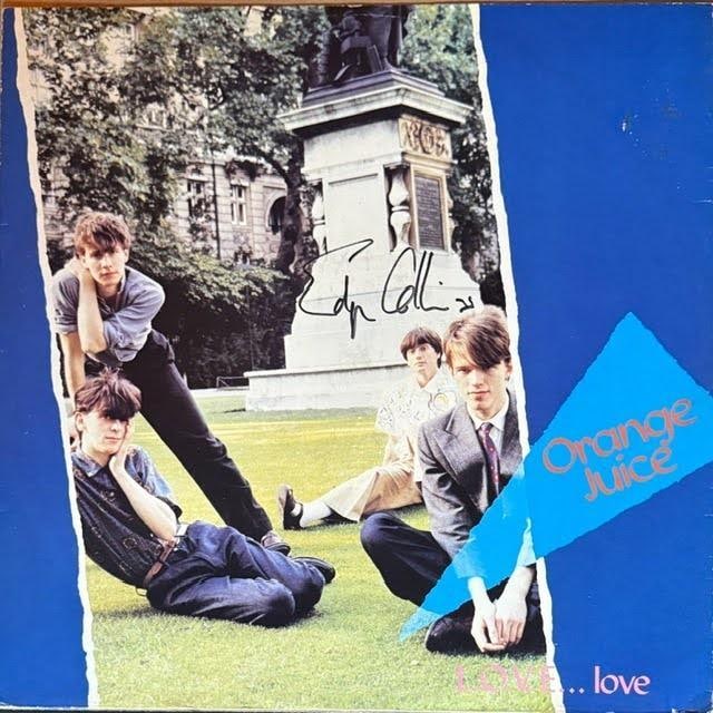 Orange Juice: Edwyn Collins Signed "L.O.V.E. Love" Album Single (Third Party Guaranteed): "L.O.V.E. Love" album single signed on the cover in black felt tip marker by Orange Juice band member Edwyn Collins. Measuring approximately 12" x 12" and in good condition with light general wear. Re