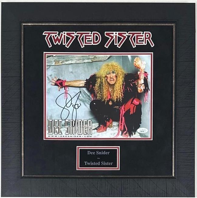 Twisted Sister: Dee Snider Signed 8" x 10" Photo Framed Display (JSA Authentication): Color 8" x 10" photo framed display signed in black felt tip marker by Twisted Sister band member Dee Snider. Signed photo measures approximately 8" x 10" and is displayed in a frame measuring 17.5"