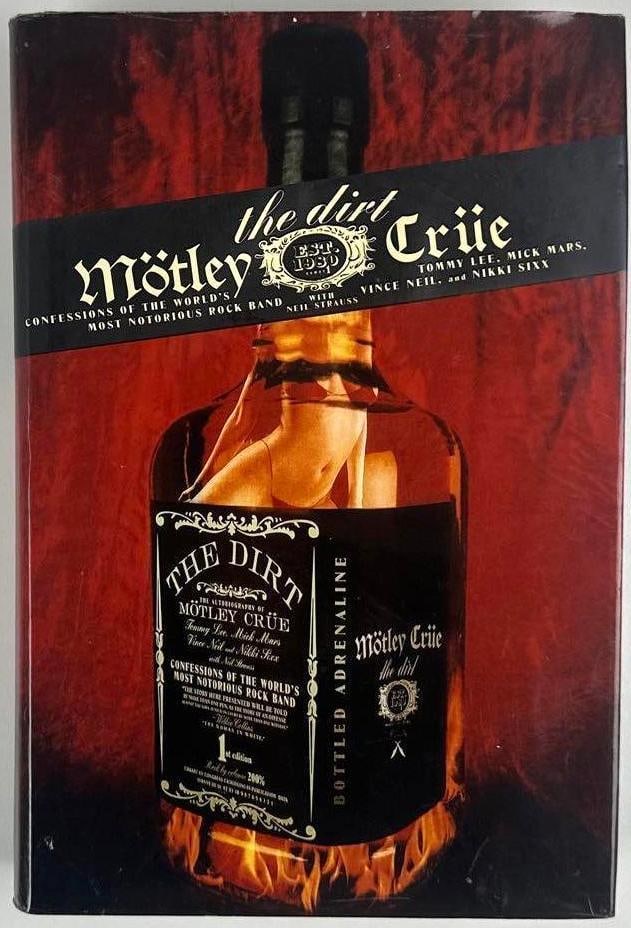Motley Crue Group Signed "The Dirt: Motley Crue" Book (3 Sigs) (Beckett): Color hardcover 9.5" x 6.5" "The Dirt: Motley Crue" book signed on the inside front page in black felt tip marker by Motley Crue band members Nikki Sixx, Vince Neil, and Mick Mars. In very good