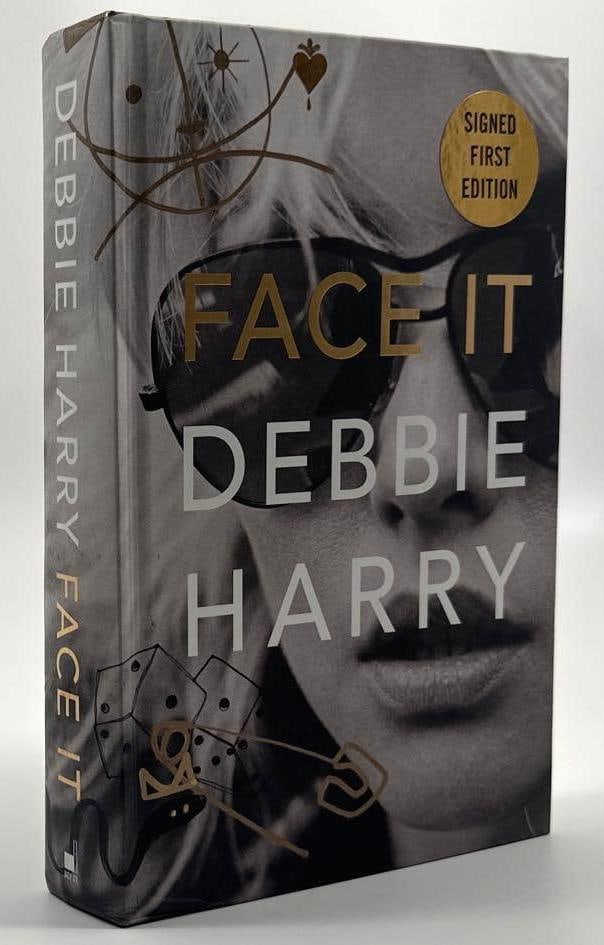 Blondie: Debbie Harry Signed "Face It" First Edition Book (JSA): Color hardcover 9.25" x 6.25" "Face It" first edition book signed on the inside front page in gold felt tip marker by Blondie front woman Debbie Harry. In fine condition. Authenticated by JSA, with
