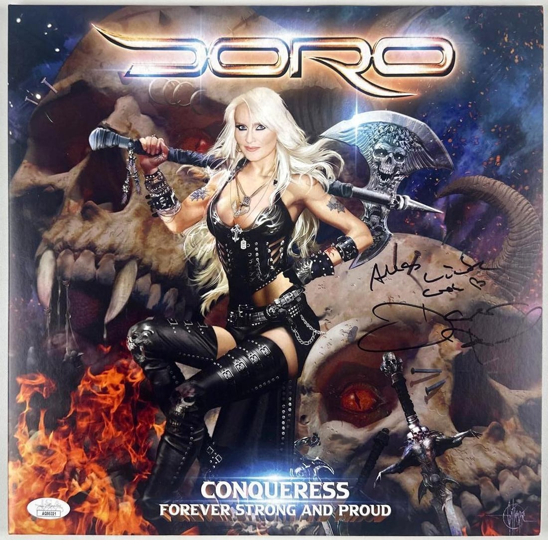 Doro Pesch Signed "Raise Your Fist" Album (JSA Authentication): "Raise Your Fist" album signed on the cover in black felt tip marker by musician Doro Pesch. Measuring approximately 12" x 12" and in fine condition. Record is included. Authenticated by JSA, with the