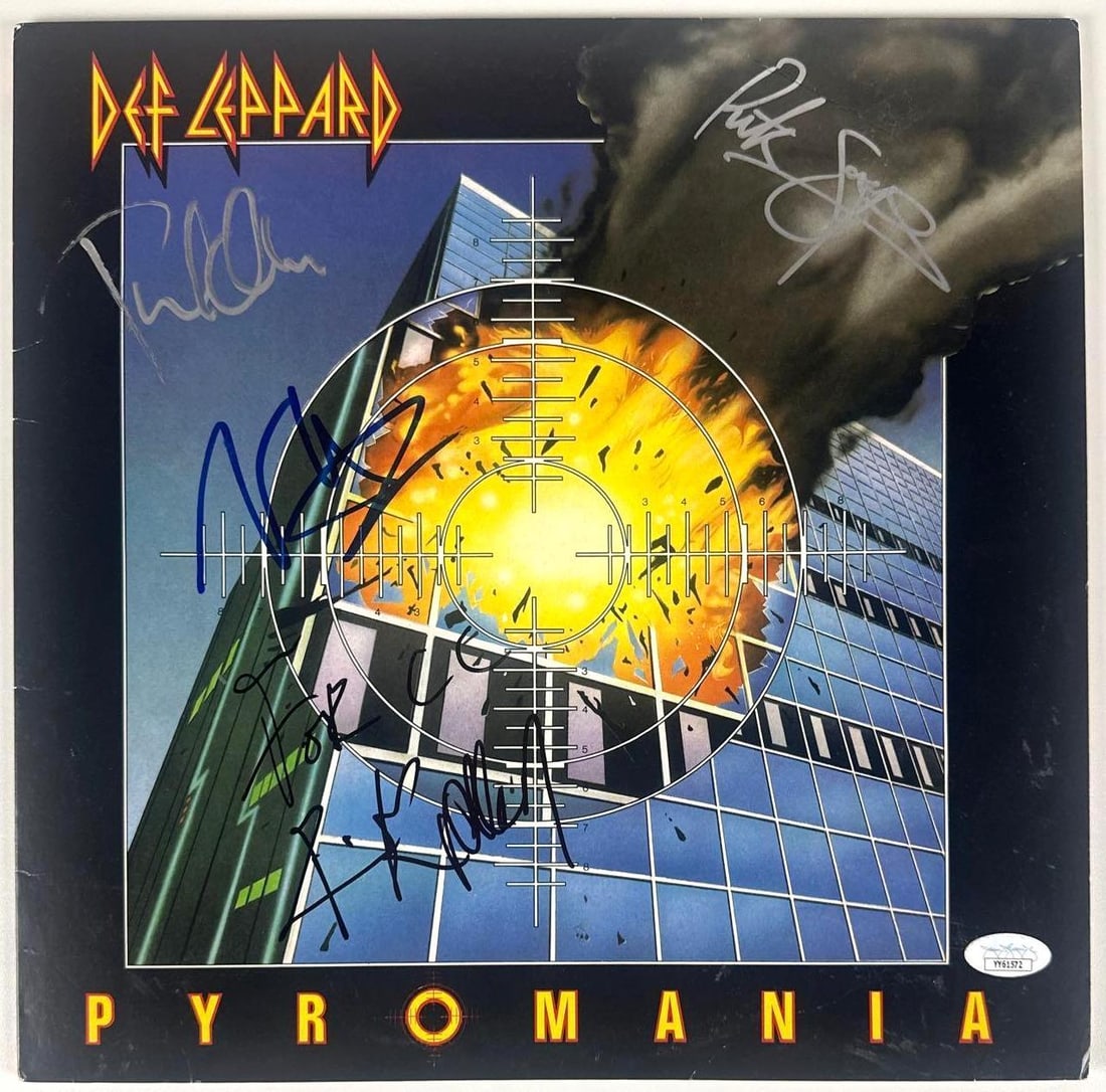 Def Leppard Group Signed "Pyromania" Album (4 Sigs) (JSA Authentication): "Pyromania" album signed on the cover in blue, black, and silver felt tip markers by Def Leppard band members Phil Collen, Rick Savage, Joe Elliott, and Rick Allen. Measuring approximately 12" x 12"