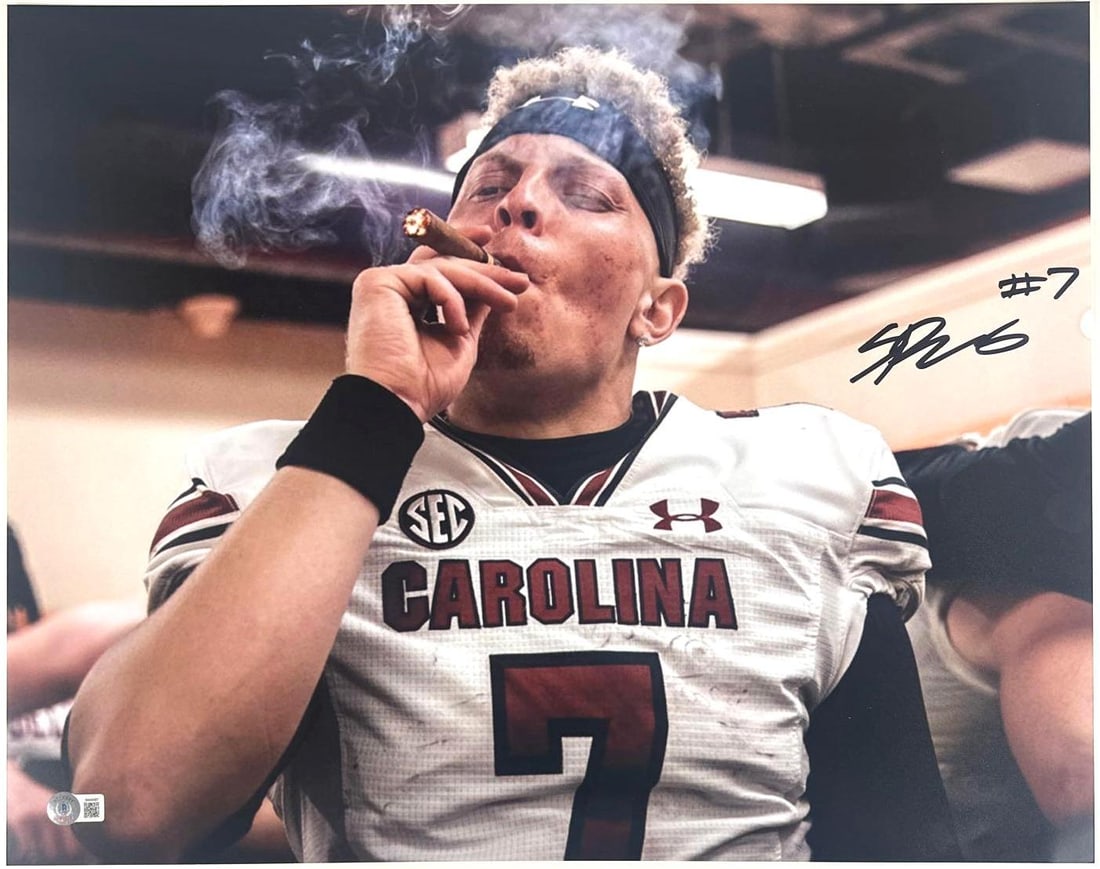 Spencer Rattler Signed 16" x 20" Photo (Beckett Authentication): Color 16" x 20" photo signed in black felt tip marker by NFL football player Spencer Rattler, who also inscribed his number "#7" after his signature. In fine condition. Authenticated by Beckett, with