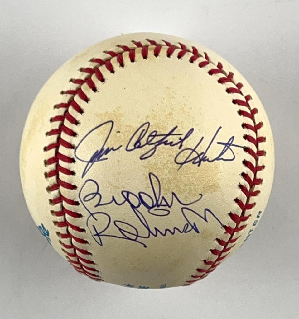 James Catfish Hunter, Brooks Robinson & Phil Niekro Signed American League Baseball (3 Sigs): White 3" Official American League baseball signed on either side in blue felt tip marker by baseball players James "Catfish" Hunter, Brooks Robinson, and Phiil Niekro. In very good condition, with
