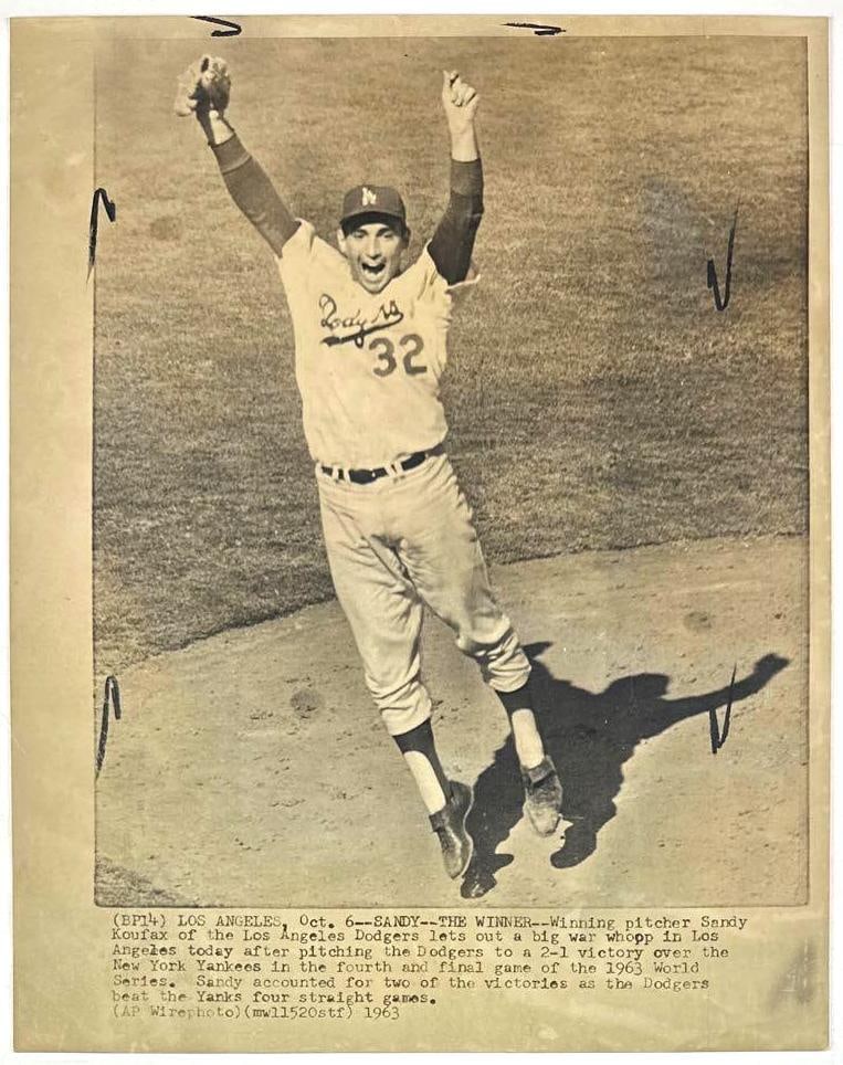 Los Angeles Dodgers Sandy Koufax 1963 AP Wire 14" x 11" News Service Photograph: Vintage black-and-white 14" x 11" Type 1 News Service photograph of Los Angeles Dodgers baseball player Sandy Koufax. This photo was taken on October 6th, 1963 at end of Game 4 of the World Series aft