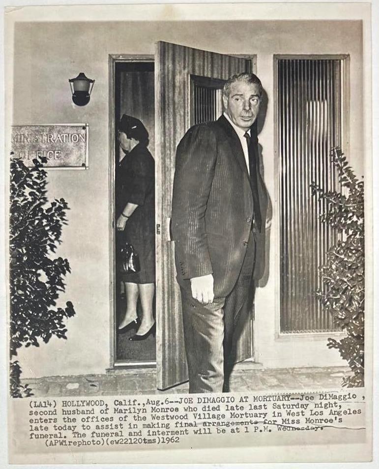 Joe DiMaggio at Funeral of Marilyn Monroe 1962 AP Wire 14" x 11" News Service Photograph: Vintage black-and-white 14" x 11 1962 News Service photograph of New York Yankees baseball player Joe DiMaggio.This photo was taken on August 6th, 1962, as DiMaggio visits the Westwood Village