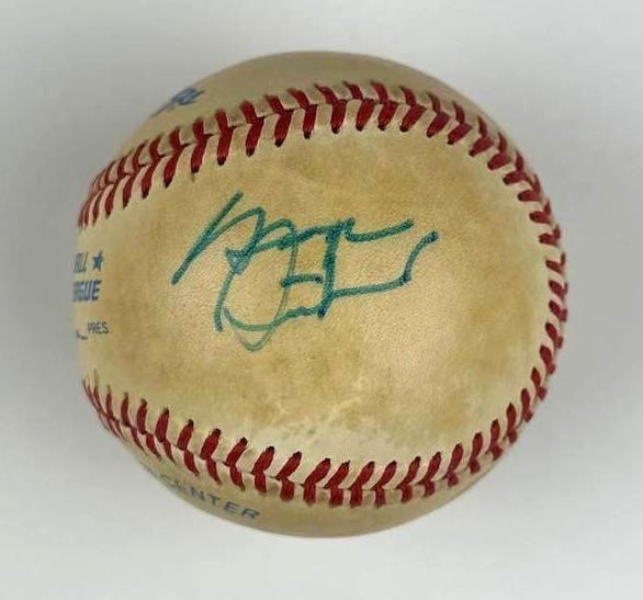 George Steinbrenner Signed Rawlings Brand Official American League Baseball (JSA): White 3" x 3" Rawlings Brand Official American League baseball signed on the side panel in blue ballpoint pen by former Yankees team owner George Steinbrenner. In very good condition, with some signs