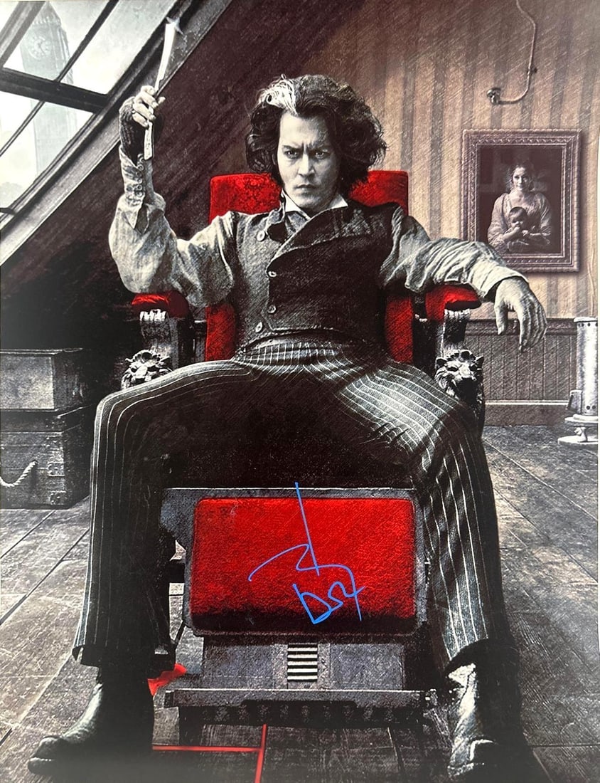 Sweeney Todd: Johnny Depp Signed 16" x 20" Photo (Third Party Guaranteed): Color 16" x 20" photo of the character Sweeney Todd from the film "Sweeney Todd" signed in blue felt tip marker by actor Johnny Depp. In fine condition. Provenance Eaton & Brennan Auctions guarantees
