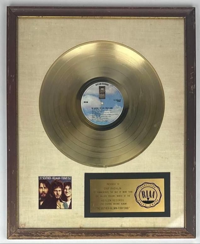Souther-Hillman-Furay Band Debut RIAA Sales Award Presented to Chip Rachlin: RIAA Certified Sales Award presented to Chip Rachlin to commemorate the sale of more than $1,000,000 worth of the Asylum Records album "The Souther-Hillman-Furay Band" by The Souther-Hillman-Furay Ban