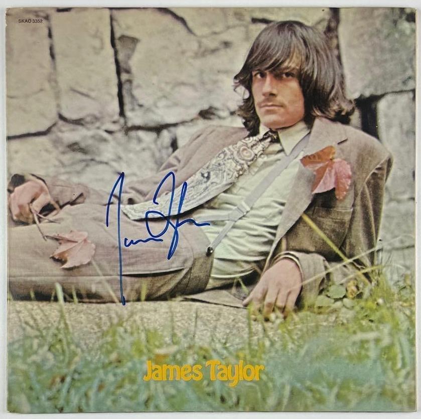 James Taylor Signed Debut "S/T" Album (Beckett Authentication): "James Taylor" album signed on the cover in blue felt tip marker by musician James Taylor. Measuring approximately 12" x 12" and in fine condition. Record is included. Authenticated by Beckett, with