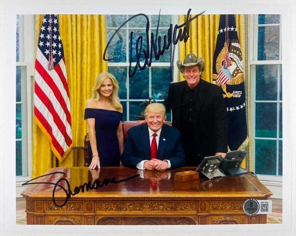Ted Nugent & Shemane Nugent Signed Photo w/ Donald Trump (Beckett Authentication): Color photo of musician Ted Nugent and Shemane Nugent with Donald Trump in the Oval Office, signed by Ted Nugent and Shemane Nugent in black felt tip marker. Accompanied by a Beckett Authentication