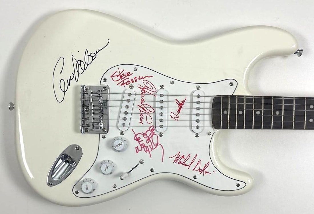Heart Group Signed Fender Squier Bullet Stratocaster-Style Electric Guitar (5 Sigs) (JSA): White Fender Squier Bullet Stratocaster electric guitar signed on the pickguard and the body in red and black felt tip markers by Heart band members Ann Wilson, Nancy Wilson, Steve Fossen, Michael Der